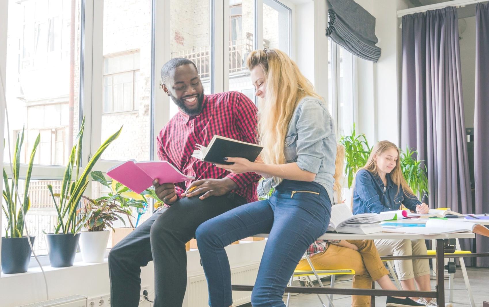 Collaborative financial planning session demonstrating entrepreneurial approach to money management